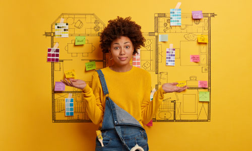 Young woman planning house repairs - DG Pinnacle Home Loans Miami