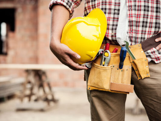 Self-employed construction worker with yellow helmet - DG Pinnacle Home Loans - Miami Mortgage Lender