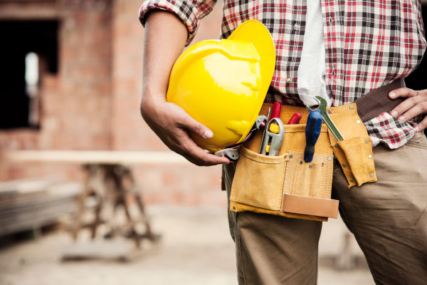 Self-employed construction worker with yellow helmet - DG Pinnacle Home Loans - Miami Mortgage Lender