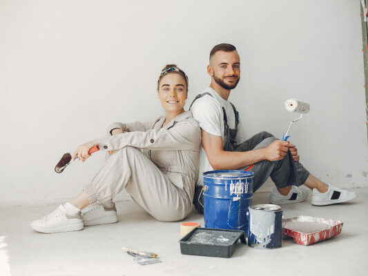 Young couple making some repairs to their home | Renovation Mortgages - FHA 203K loans | DG Pinnacle Home Loans - Miami Mortgage Lender
