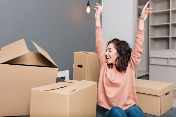 Young freelancer woman moving to her new house | Mortgage Loans For Self-Employed Borrowers | DG Pinnacle Home Loans - Miami Mortgage Lender
